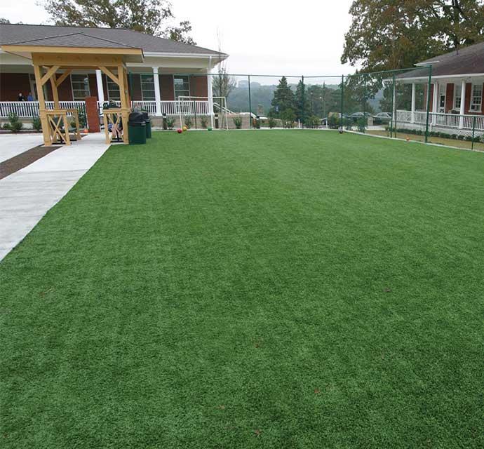 Lawn area and walking path at a residential community.