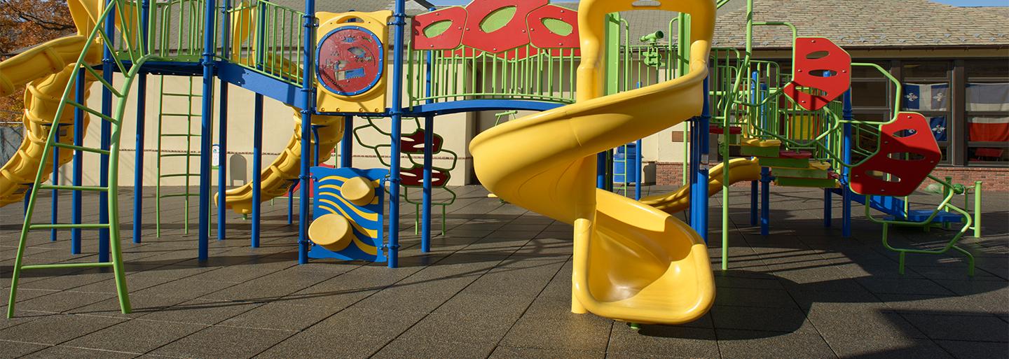 Playgrounds surfacing with a colorful array of play equipment