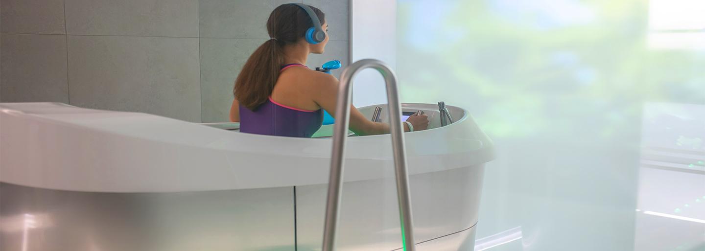 A woman athlete in a hydrotherapy machine