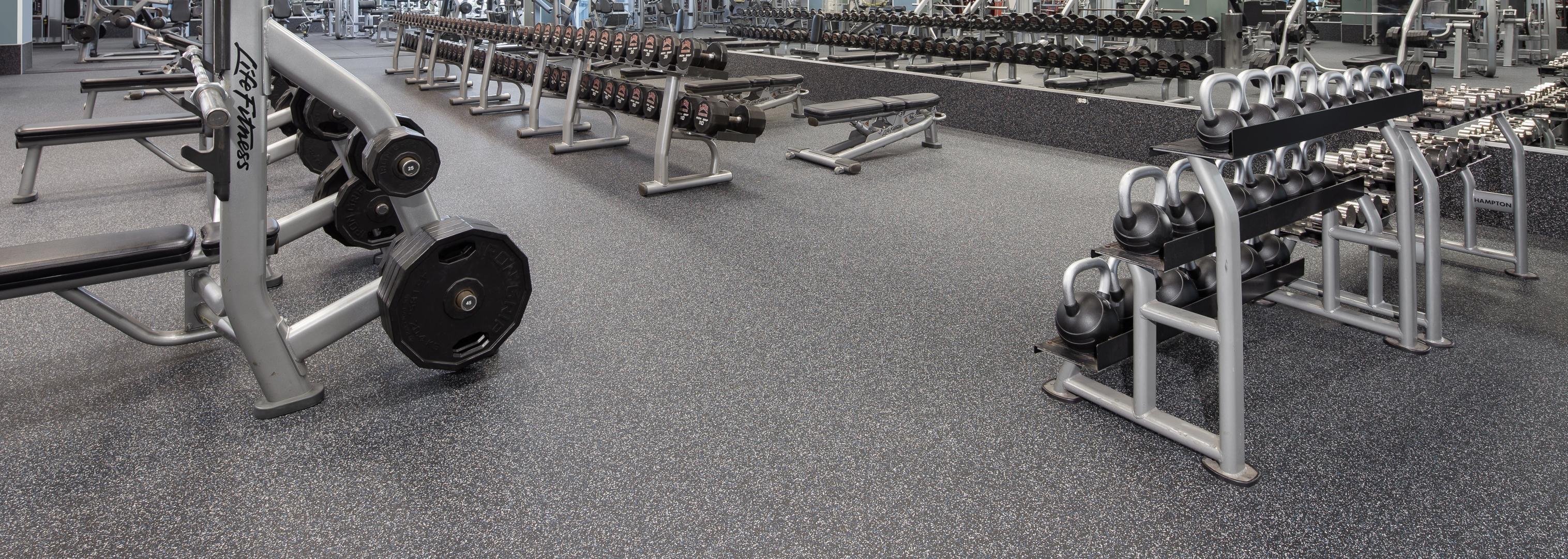 A Gym setting with work out equipment with Ecore's Fit Collection Installed.