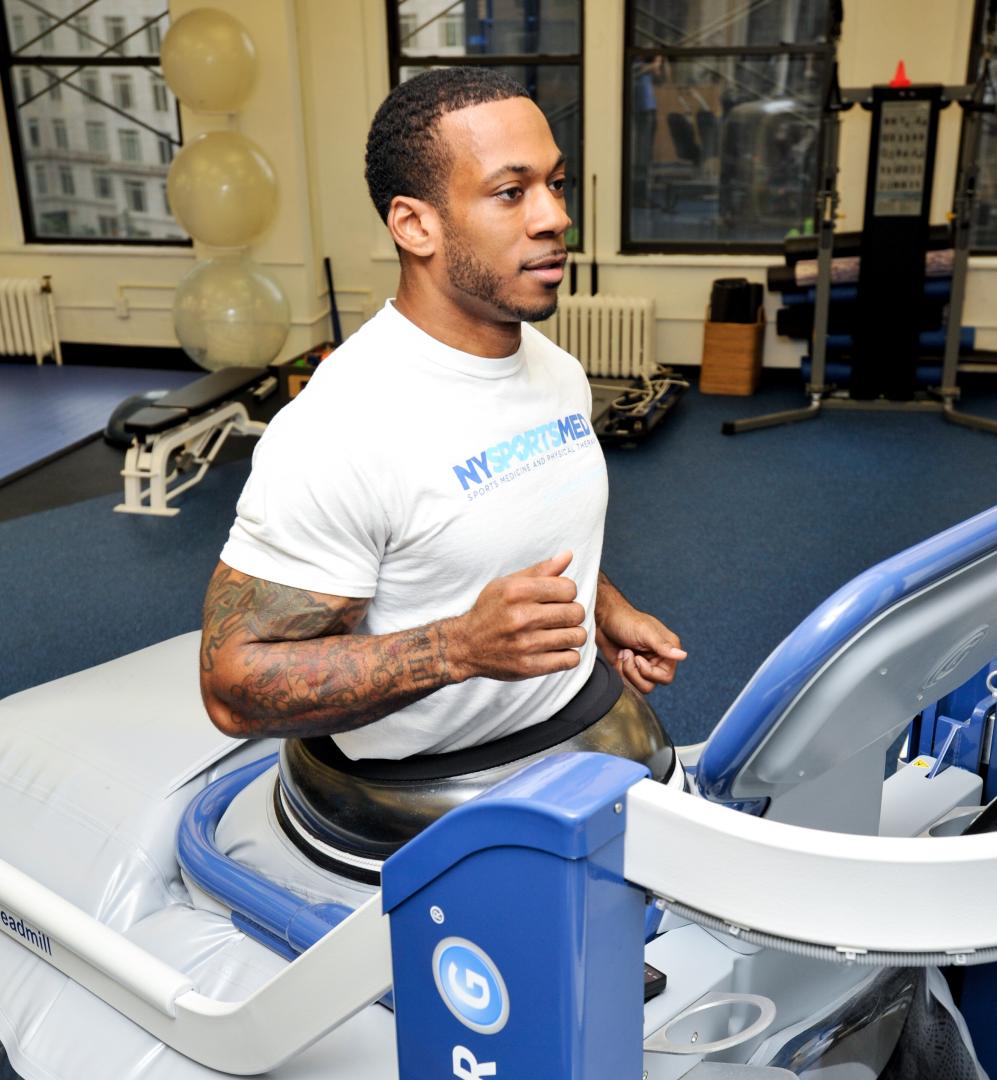 A man doing a physical therapy exercise while running