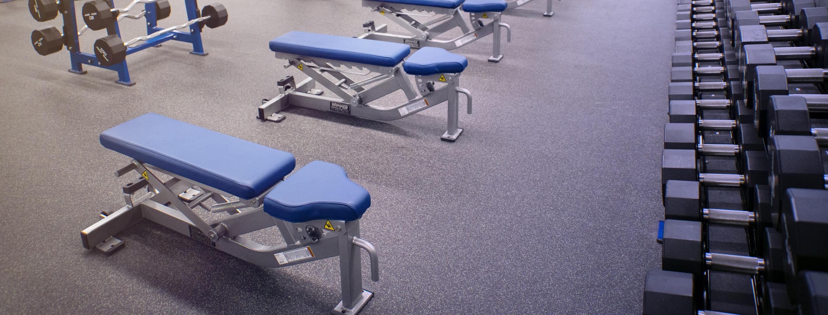 commercial fitness center with performance rubber flooring