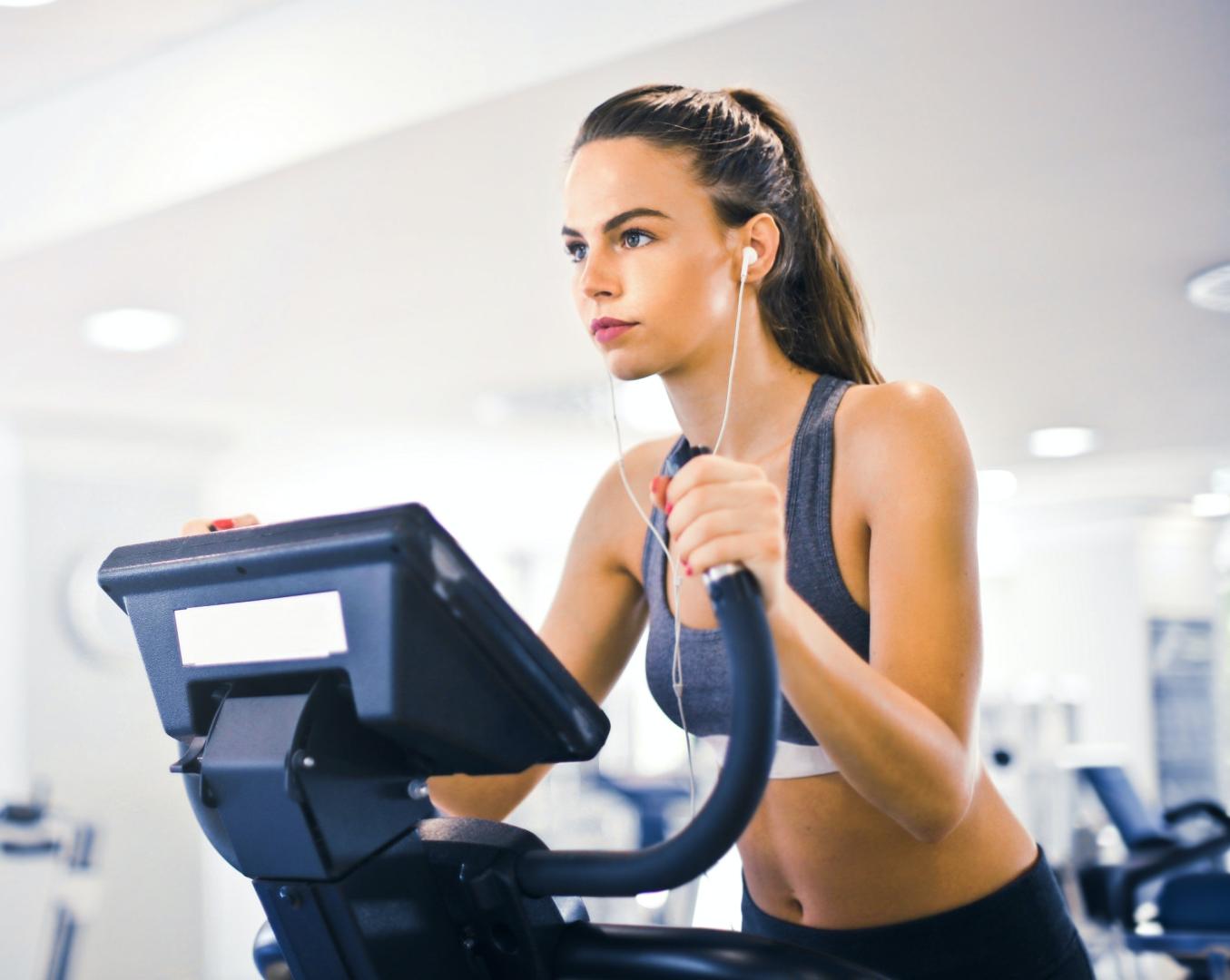 A woman on an elliptical working out