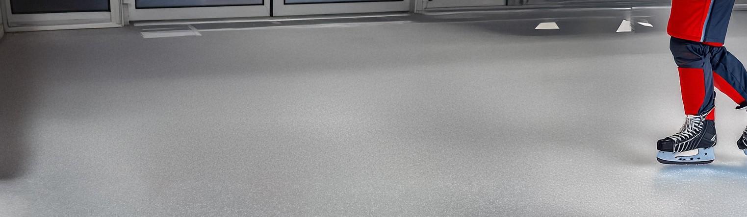 ComPact-Fleck Ice installed with a hockey player walking on it.