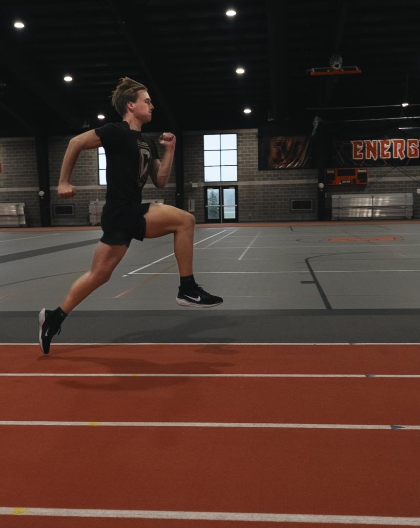 Student Athlete Running on Track