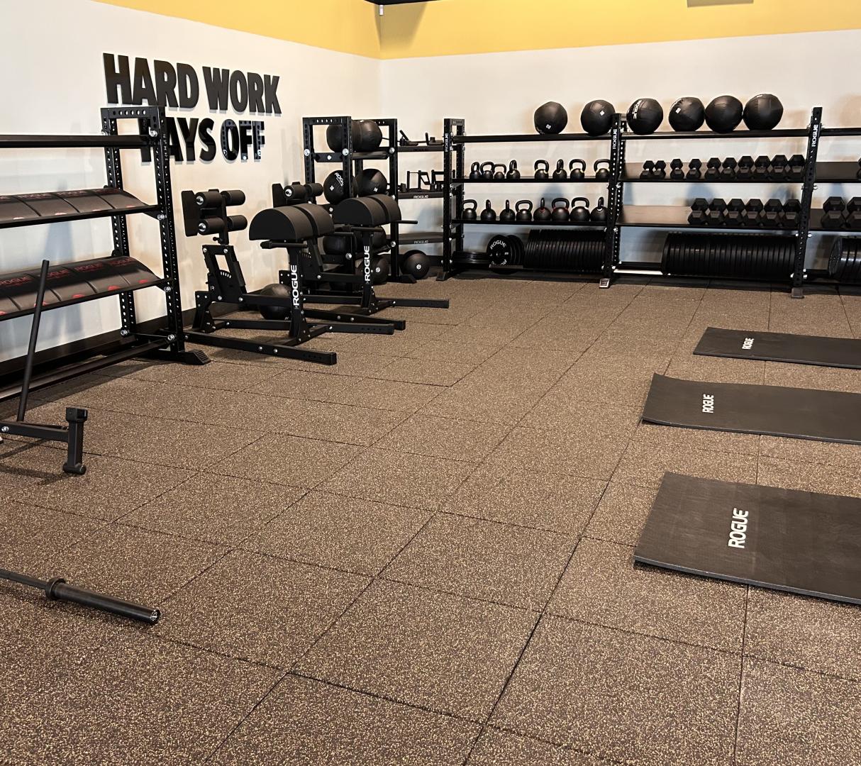 A fitness center with a variety of fitness equipment