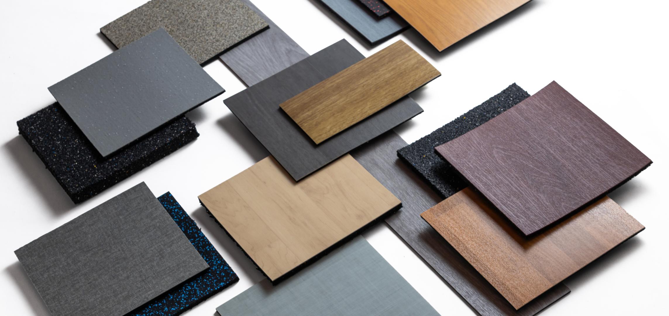 A bunch of flooring samples laid out