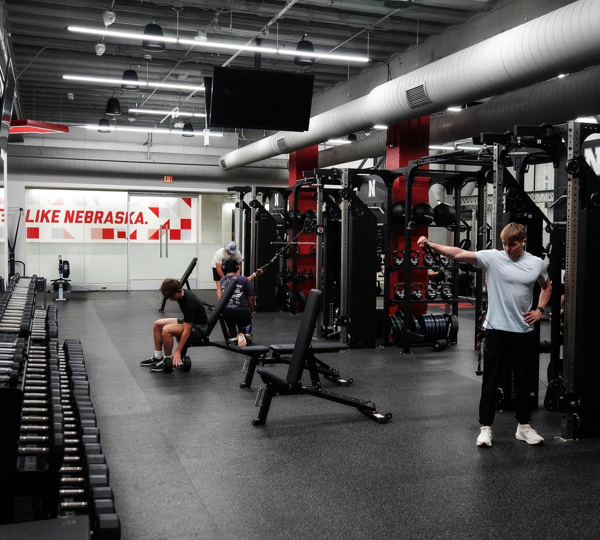 a group of students working out in a fitness center